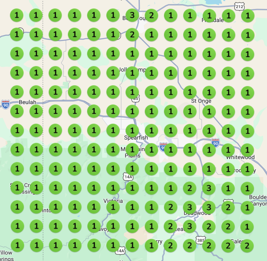 Geo grid after our build: rankings of 1 to 3 across the same area, shown in green